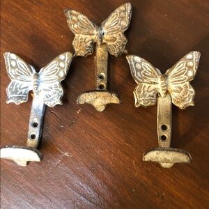 Older cast iron Butterfly Wall Hooks  Set if 3 
24 years old